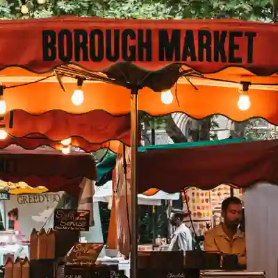Borough Market Food stall with Borough Market sign.