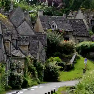Cotswolds Picturesque village lane with cottages.