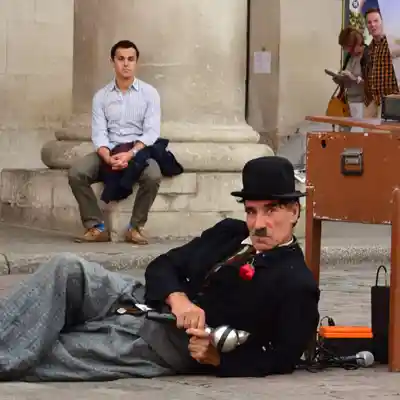 Street performer dressed as Charlie Chaplin.