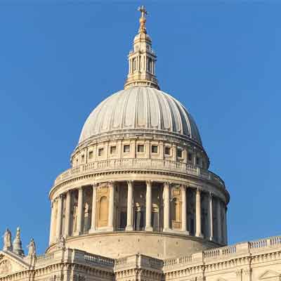 The imposing dome against a clear blue sky.