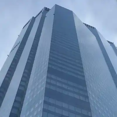 Towering glass exterior of the skyscraper.