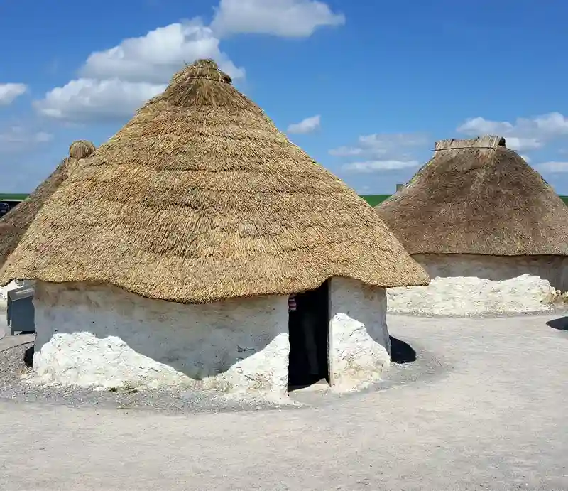 Stonehenge Visitor Centre Straw roof Bronze Age huts.