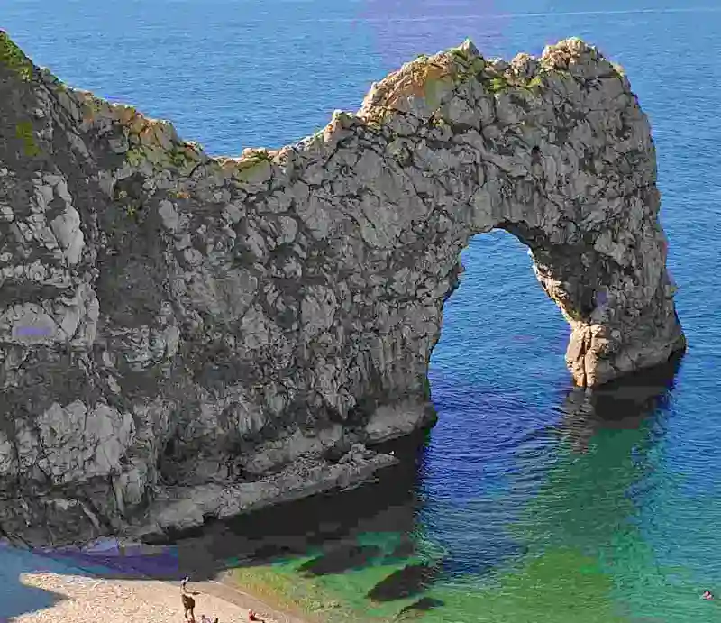 Durdle Door Natural limestone arch jutting out into the sea.
