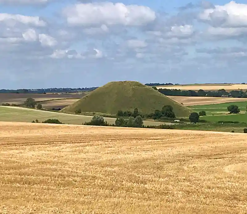 The monument surrounded by fields.