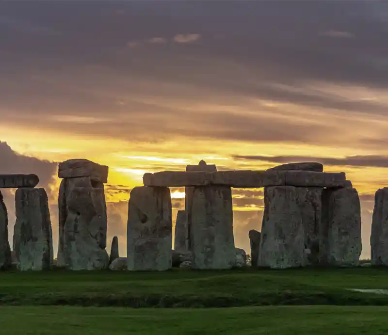 Stonehenge The stones with red skies at sunrise.