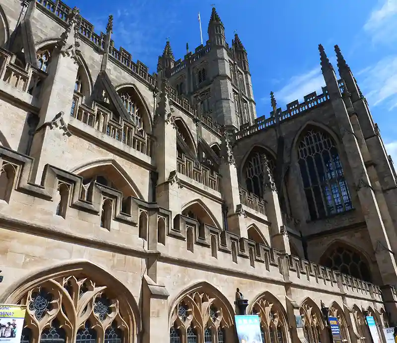 Bath Abbey Interior with arches and pews.
