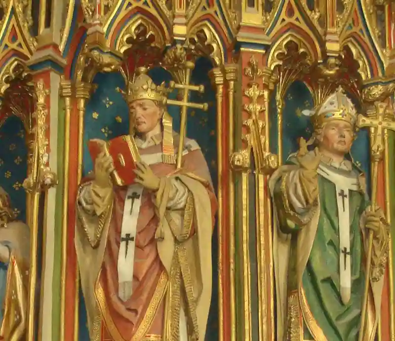 Interior ornate guilt and painted holy men in High Gothic style.