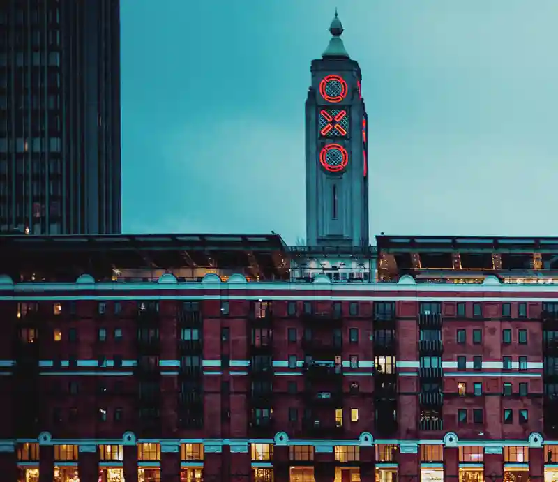 Oxo Tower With red lit up letters at dusk.