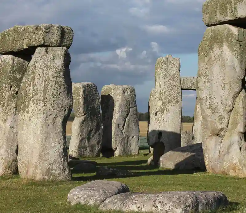 Stonehenge The stones beneath a dramatic grey sky.