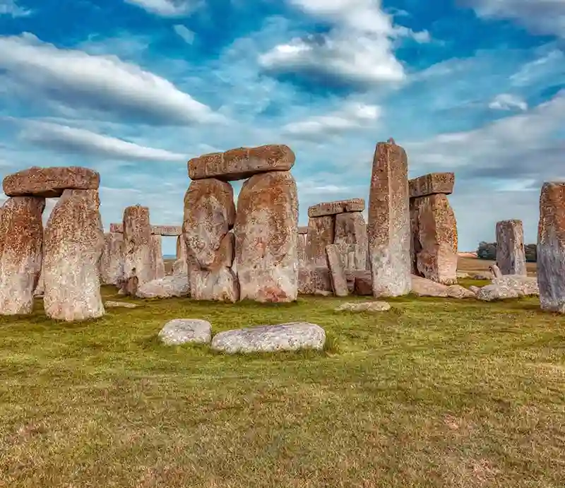 Close view of the stones with blue sky and white clouds.