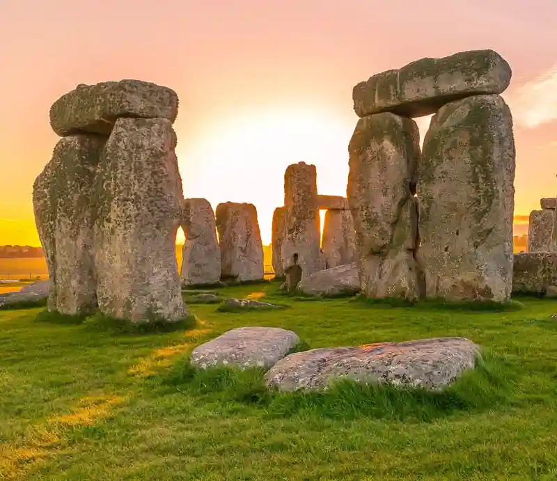 Stonehenge The stones at dawn under a red sky.