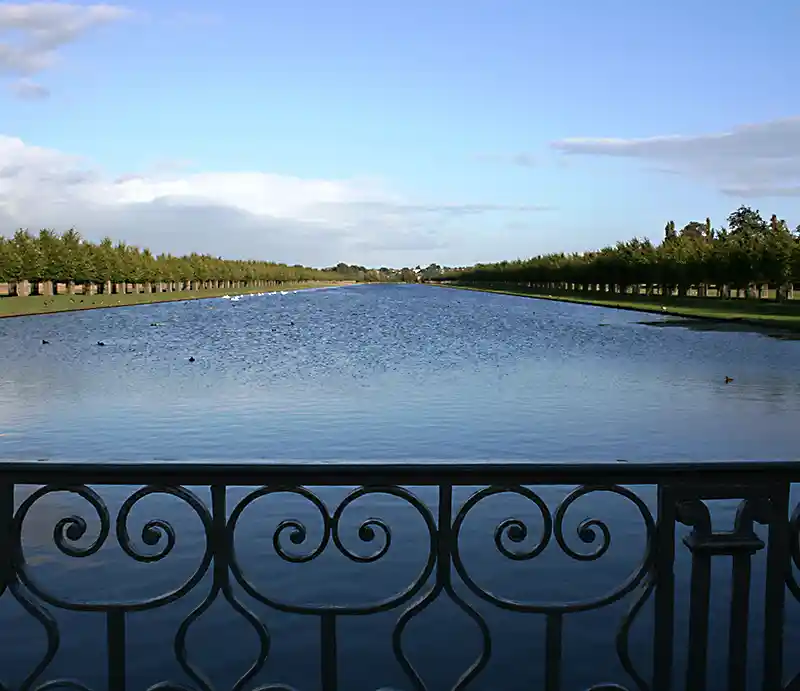 Stretching to the distance looking through railings