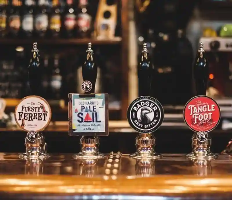 Row of draft beer pumps.