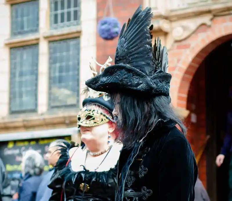 Whitby town Couple celebrating the Goth Weekend.