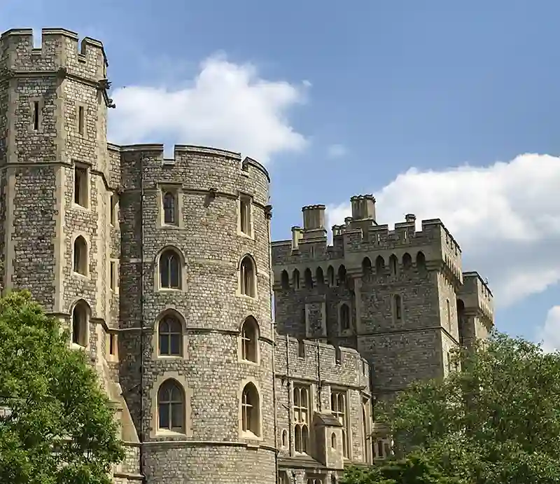 Exterior stone walls and round tower.