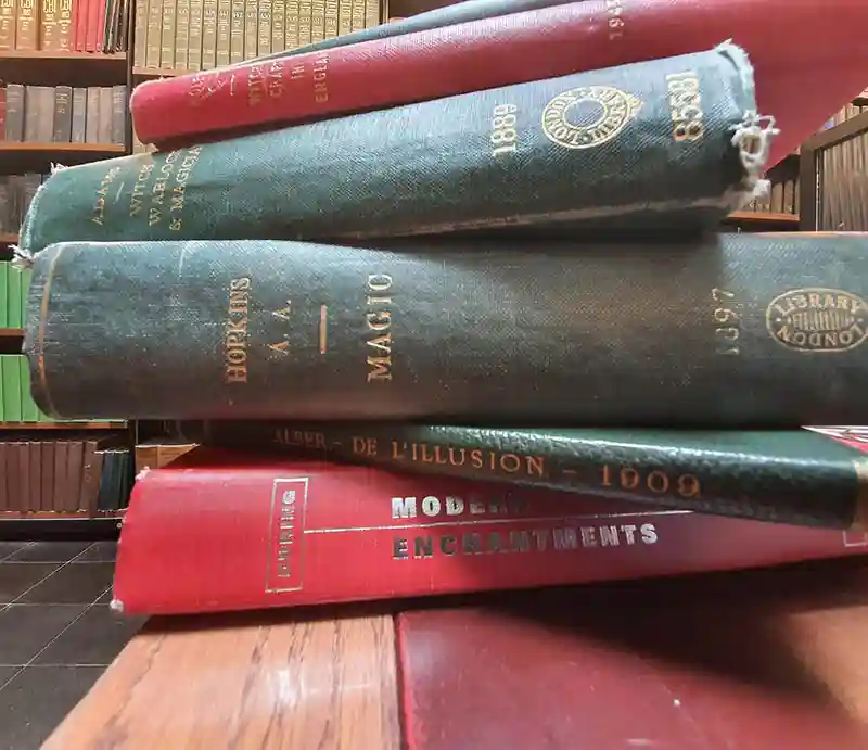 Pile of magic books Antiquarian grimoires and spell books used to prepare the London Magic Tour.
