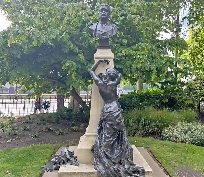 Arthur Sullivan Memorial Bronze figure of a woman weeping.