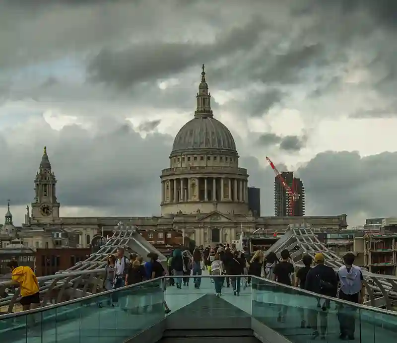 Millennium Bridge With pedestrians and St Paul's Cathedral in distance.
