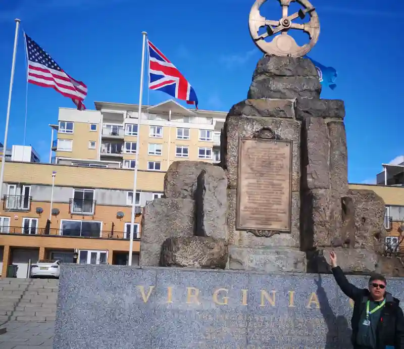 Virginia Quay Settlers Monument Rough-hewn granite base topped with a bronze mariner's astrolabe.