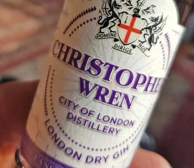 Christopher Wren Gin Bottle with label showing George Cross and London Distillery brand.
