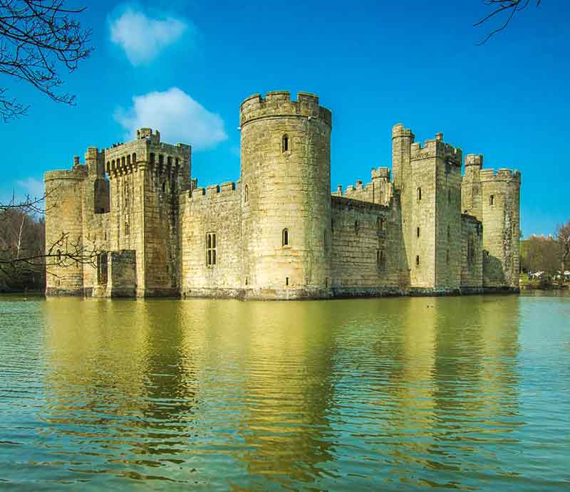 Sussex Tour Bodiam Castle reflected in the lake..