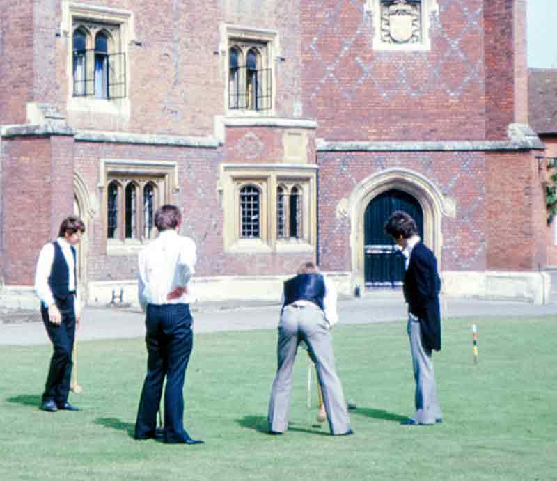 Eton College Etonians playing croquet on the lawn.