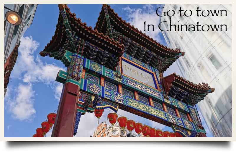 Chinatown tours postcard Ornate Chinese gate with Qing Dynasty motifs.