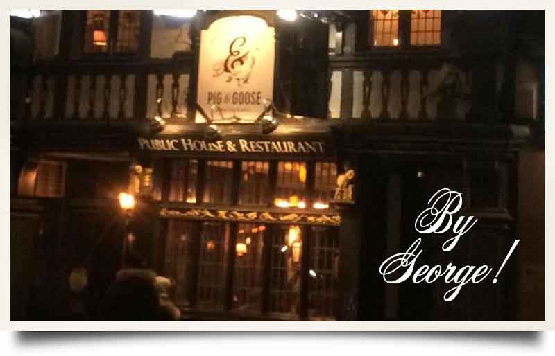 George Pub Holborn tours postcard Illuminated exterior at night with caption 'By George!'.