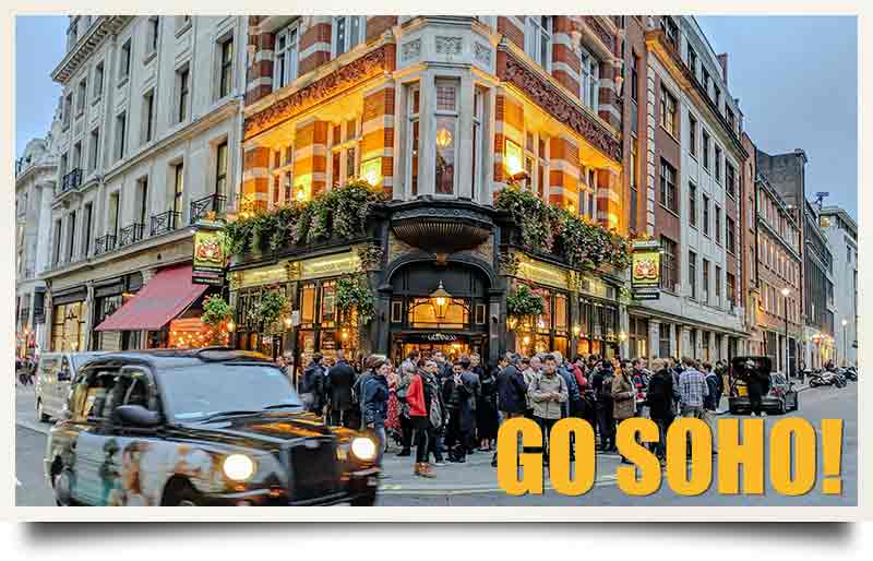 Soho tours postcard Customers outside a pub with black taxi cab and caption 'Go Soho!'