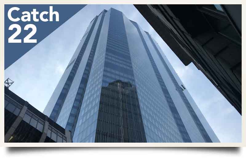 Twentytwo Skyscraper tours postcard Towering glass exterior with caption 'Catch 22'.
