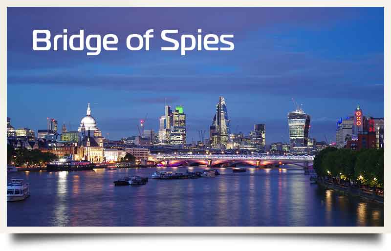 Waterloo Bridge tours postcard View of the City of London from over the river Thames with caption 'Bridge of Spies''