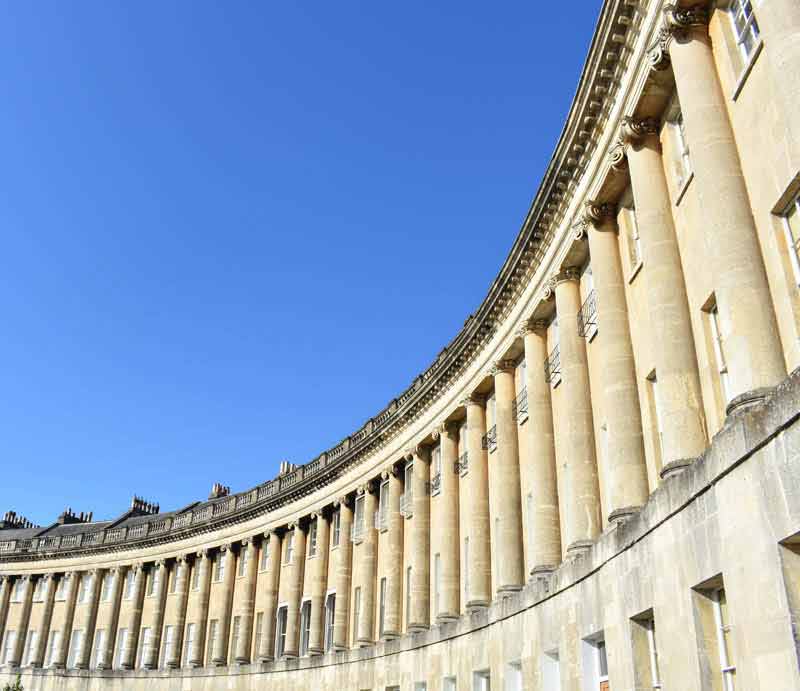 Royal Crescent The Georgian architecture beneath a clear blue sky.