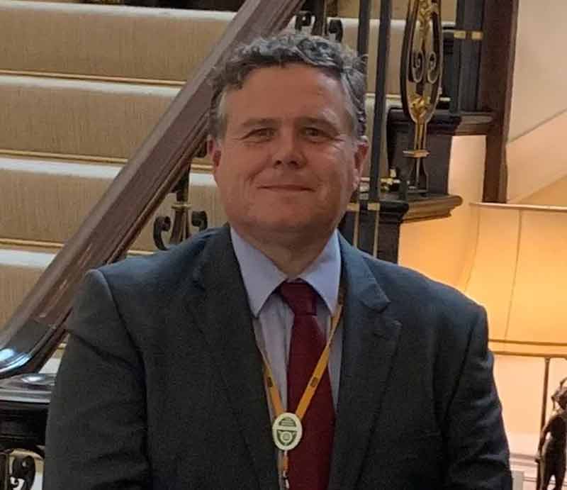 Tony Podowski At the American Embassy wearing his Green Badge for touring.